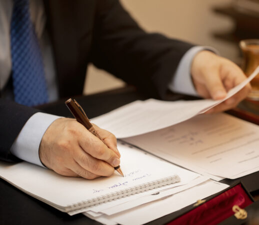 Businessman signing important contract papers. High quality photo